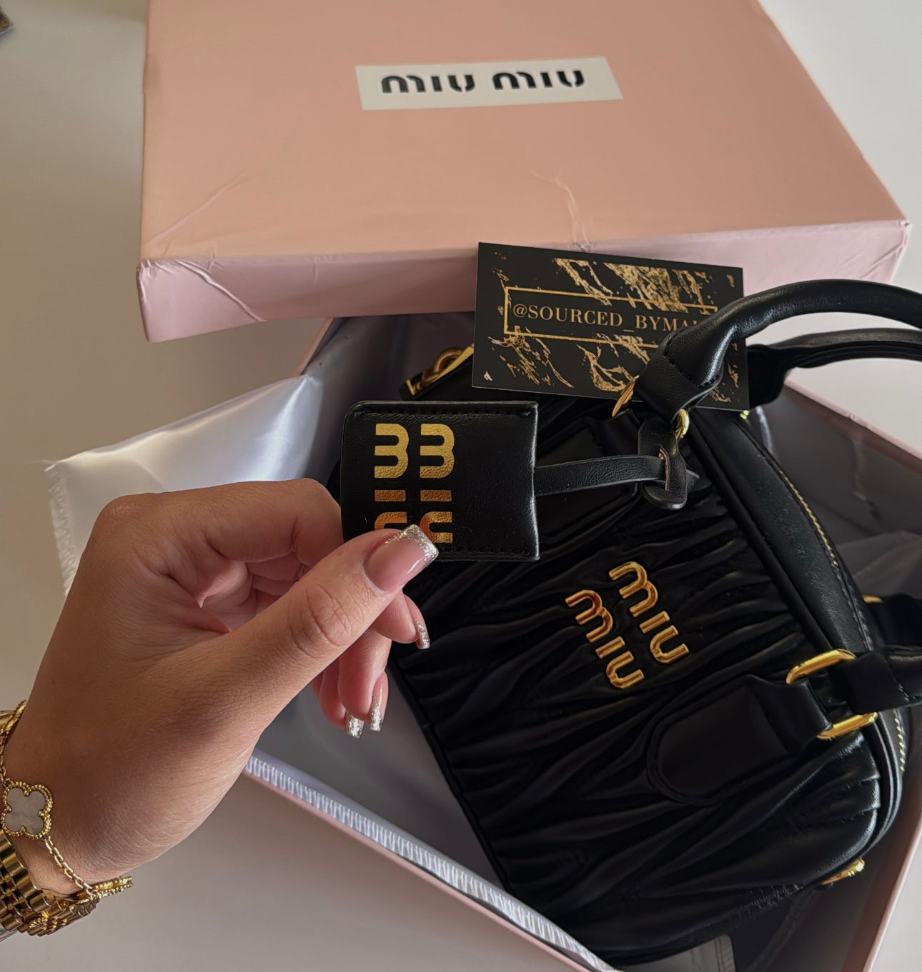 Black MuiMui Bag